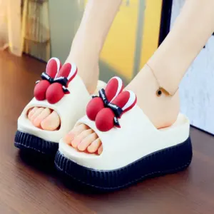 Wedge ear platform clogs